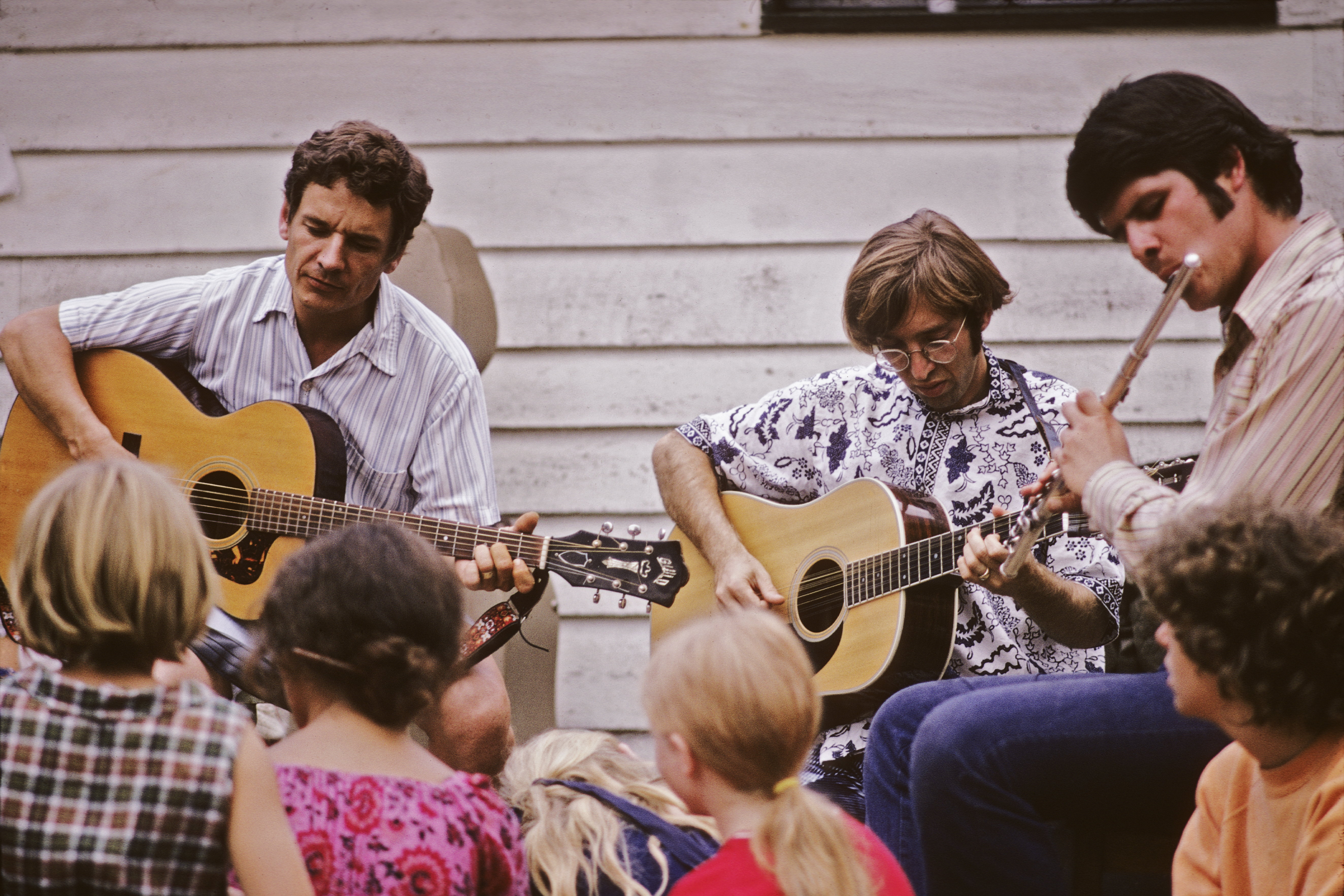 Hamid Hamilton Camp (with his Guild guitar), Waqidi Falicoff (with his 1968 Martin D12-35 12 string guitar), Loren Pickford (flute), Raphael Grinage (not seen to the left)